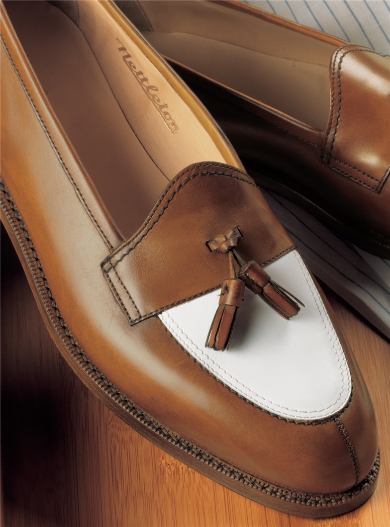 The Split Toe Tassel Loafer in Antique Tan and Cream