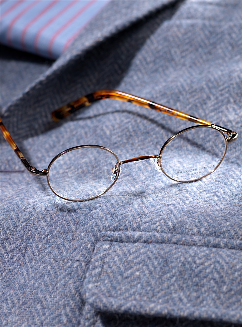 Nearly Oval Wire Frame in Gilted Metal with Amber and Tortoise